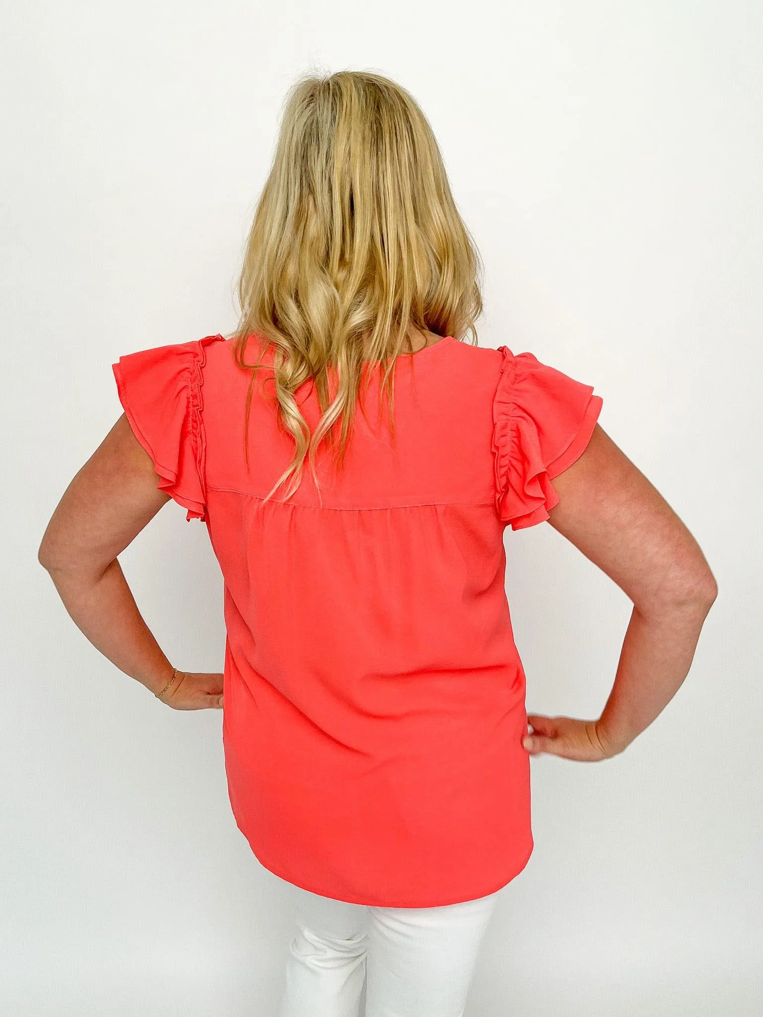 Coral Buttoned Ruffle Top