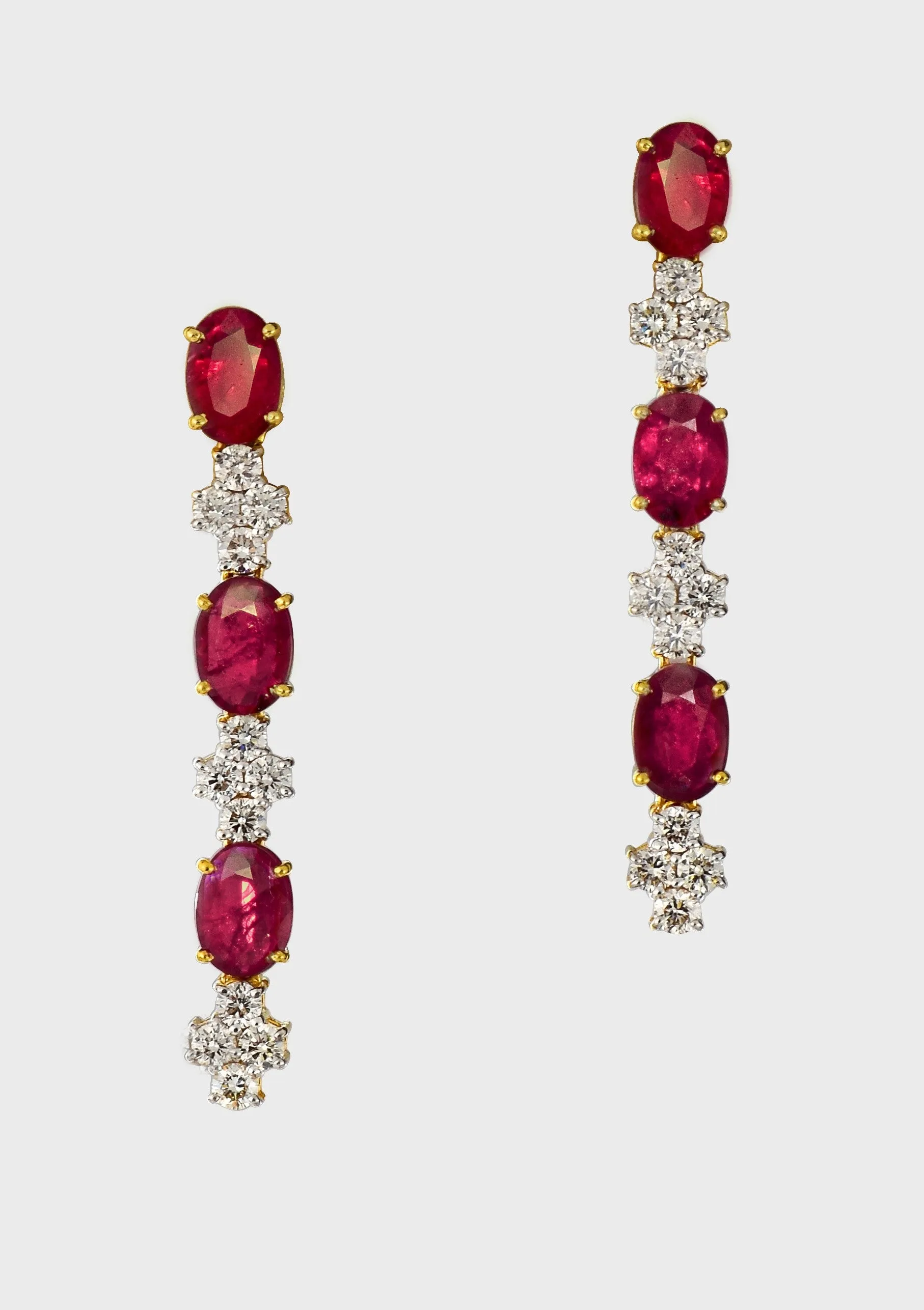 Elegance meets allure with our single line ruby and diamond necklace and earring pair. Crafted to perfection, each piece exudes timeless sophistication and luxury.