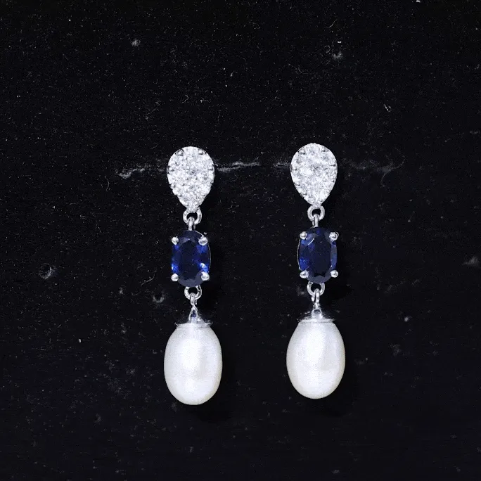 Oval Created Blue Sapphire and Freshwater Pearl Dangle Earrings with Moissanite