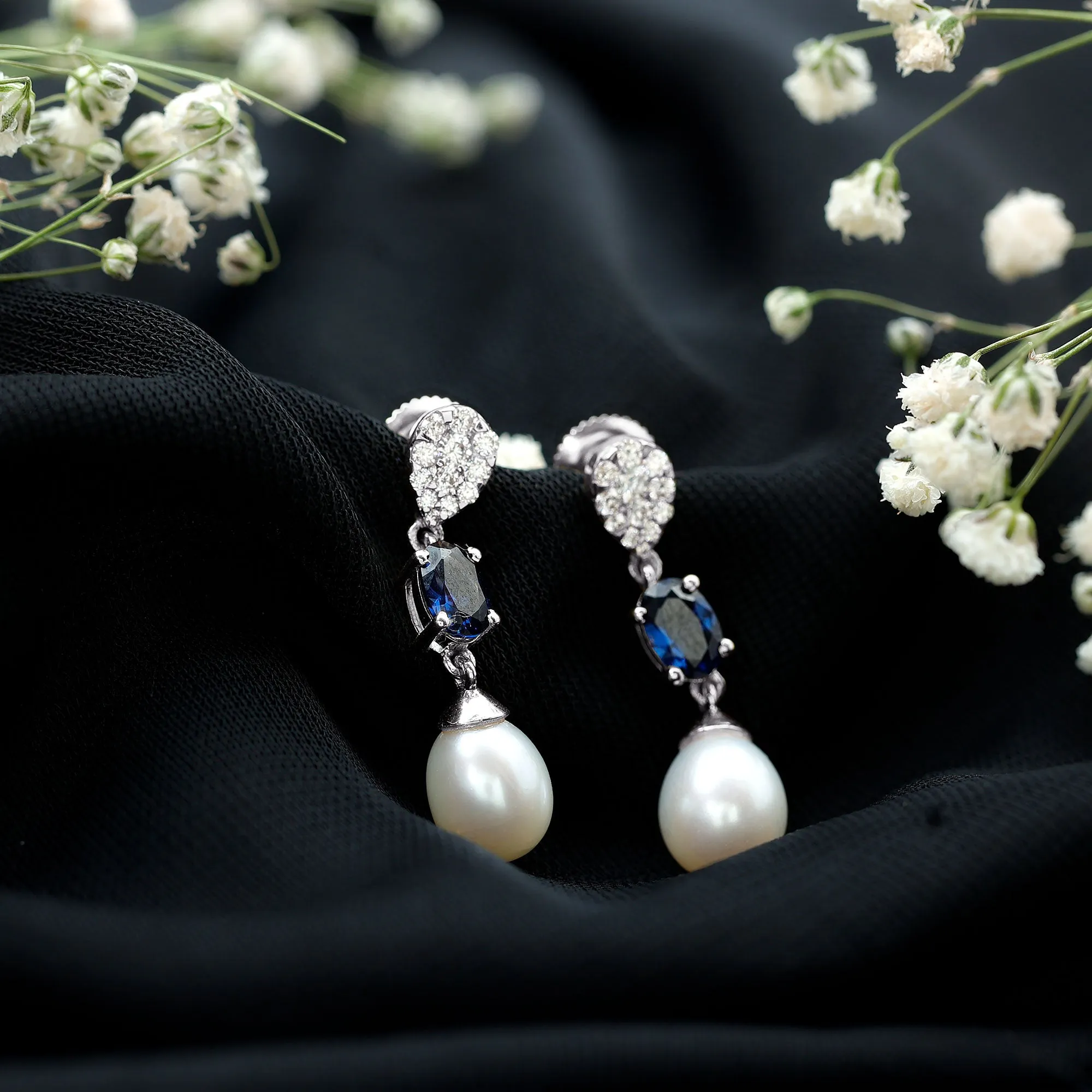 Oval Created Blue Sapphire and Freshwater Pearl Dangle Earrings with Moissanite