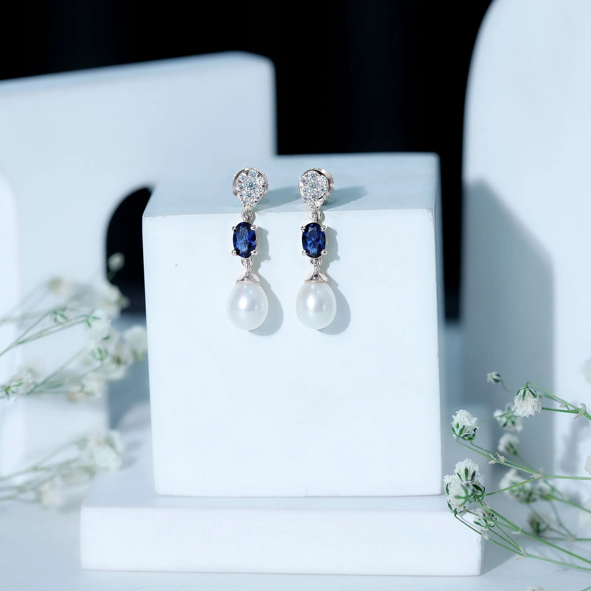 Oval Created Blue Sapphire and Freshwater Pearl Dangle Earrings with Moissanite